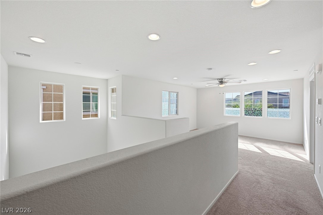 250 Dedication Avenue Henderson, NV 89011 - Photo 28 of 67 Hallway with carpet and recessed lighting