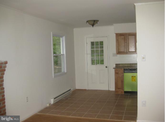 1744 Brookshire Run Point of Rocks, MD 21777 - Photo 14 of 15 a view of an empty room with a kitchen