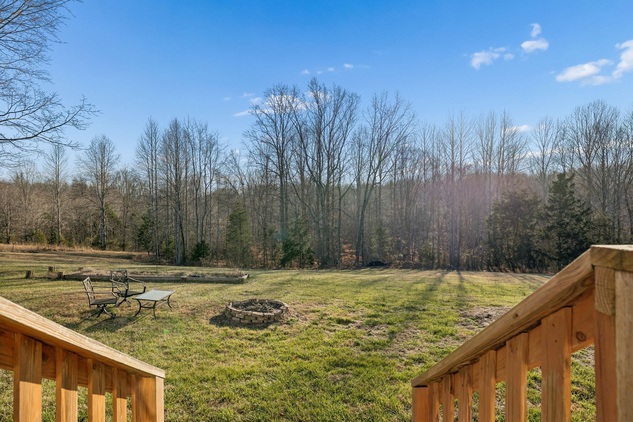 411 Purtle Road Lafayette, TN 37083 - Photo 26 of 40 a view of a pool with trees in the background