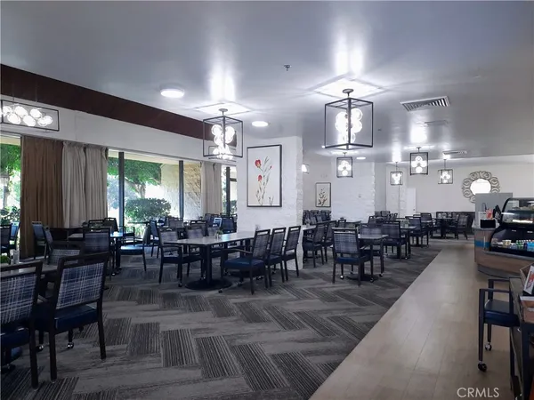 a view of a backyard with sitting area