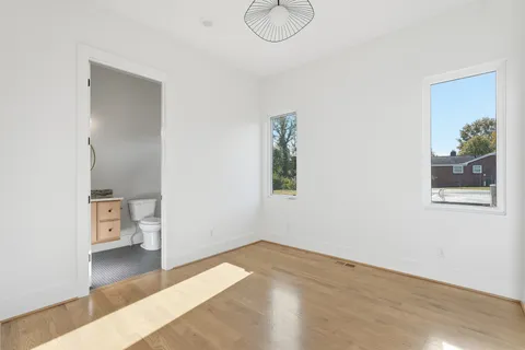 a view of livingroom with furniture and window