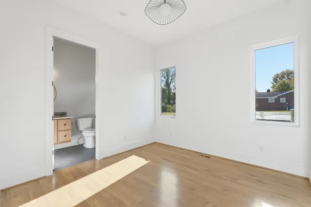 a view of a room that has a window in it