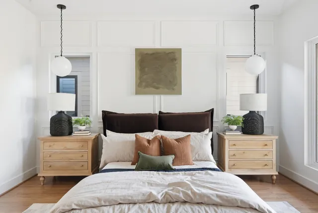 a bedroom with bed and window