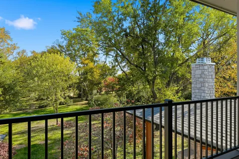 a view of a swimming pool and a yard