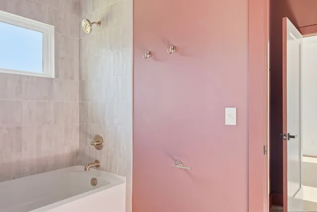 a bathroom with a bathtub