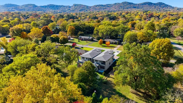 an aerial view of residential house with an outdoor space