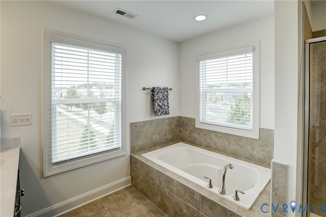 119 Thorncliff Road Ashland, VA 23005 - Photo 15 of 30 a white bath tub sitting next to a window