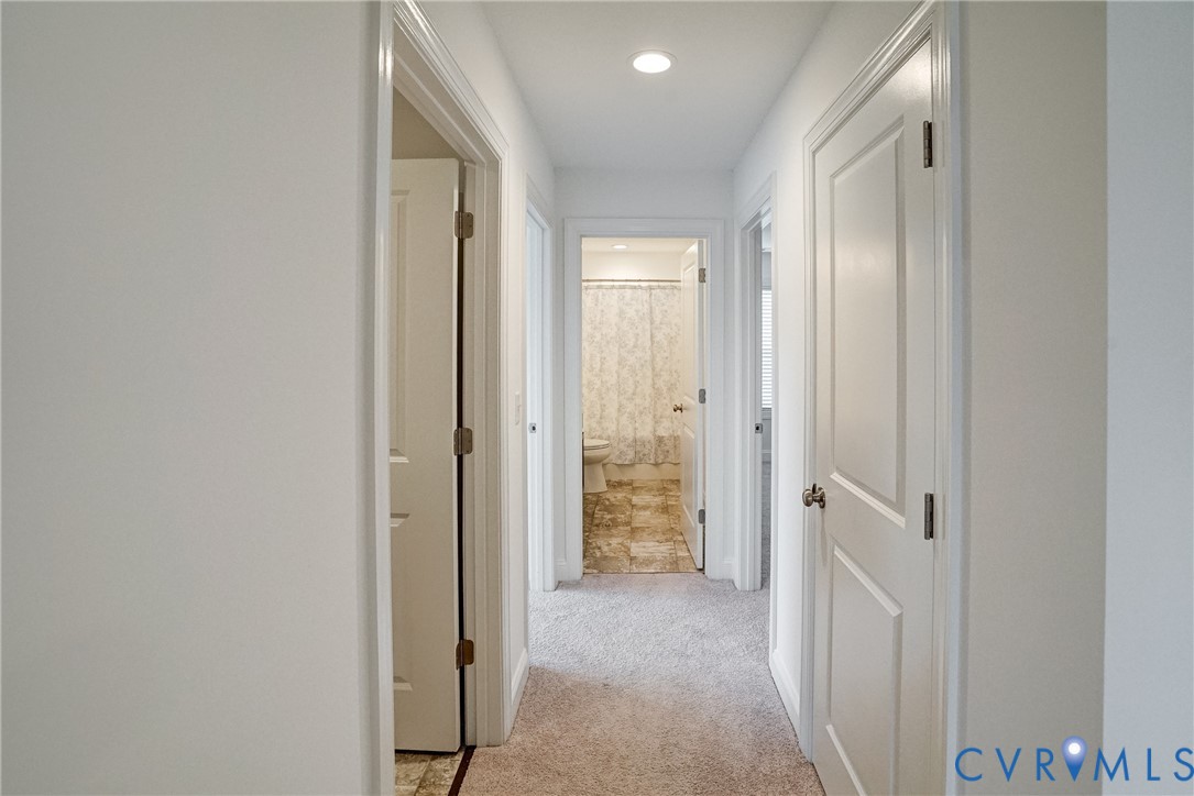 119 Thorncliff Road Ashland, VA 23005 - Photo 21 of 30 a view of a hallway with a livingroom and a bathroom