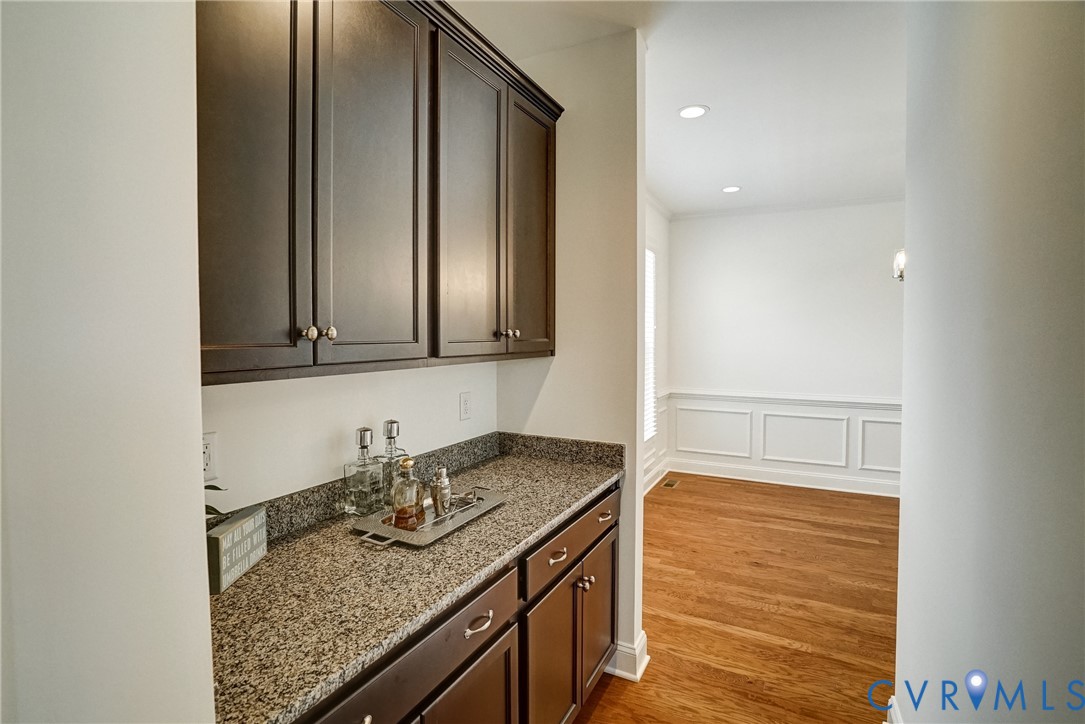 119 Thorncliff Road Ashland, VA 23005 - Photo 6 of 30 a bathroom with a granite countertop sink and a mirror