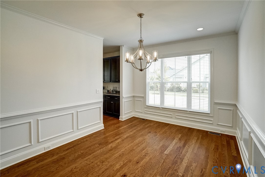 119 Thorncliff Road Ashland, VA 23005 - Photo 7 of 30 a view of an empty room with window and wooden floor