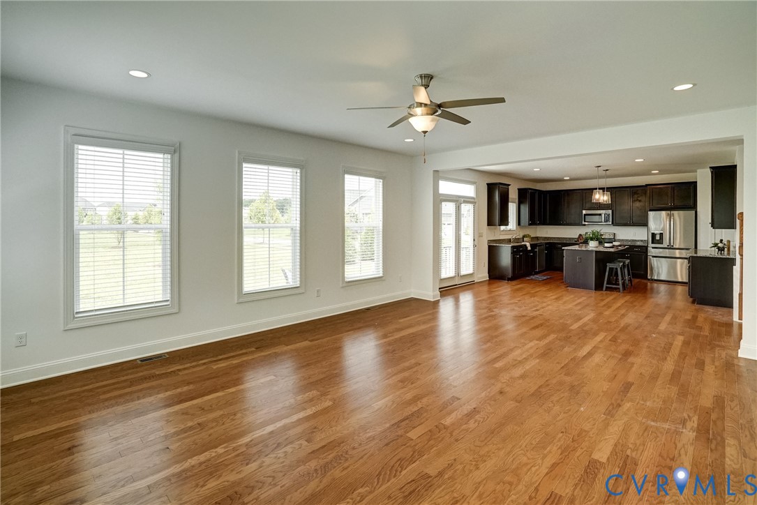 119 Thorncliff Road Ashland, VA 23005 - Photo 8 of 30 a view of an empty room with kitchen appliances and a window
