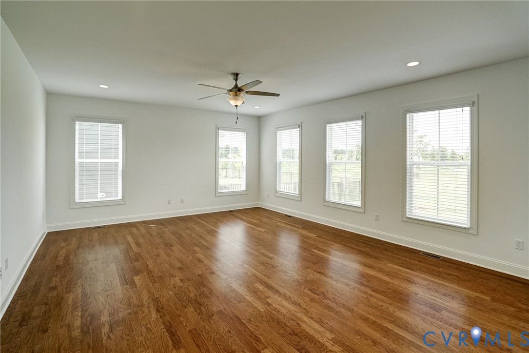 119 Thorncliff Road Ashland, VA 23005 - Photo 9 of 30 a view of an empty room with a window and wooden floor