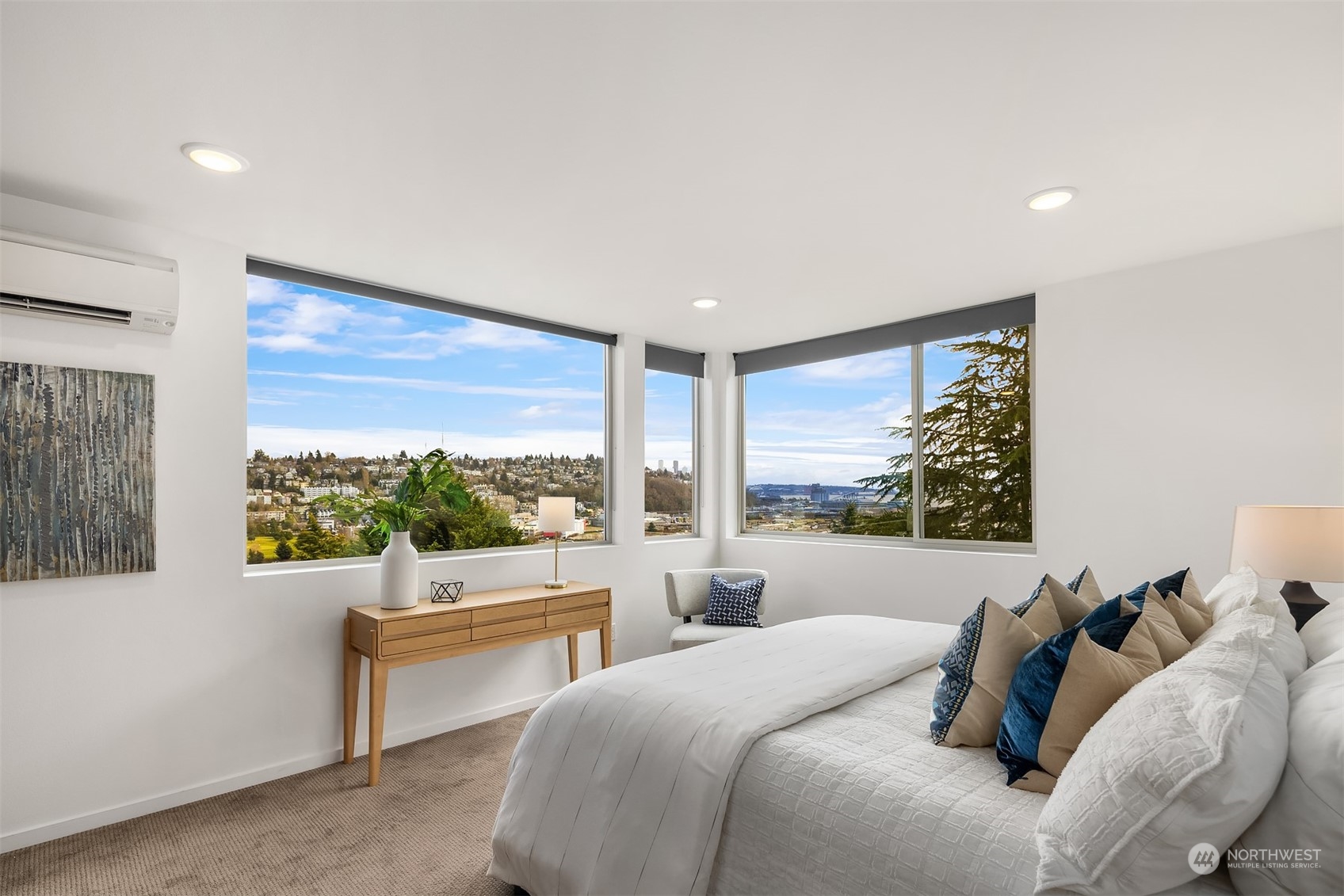 2307 West Raye Street Seattle, WA 98199 - Photo 18 of 38 a room with a bed and a large window