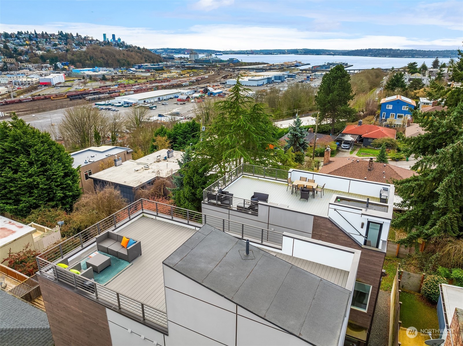 2307 West Raye Street Seattle, WA 98199 - Photo 26 of 38 a view of a city with lawn chairs