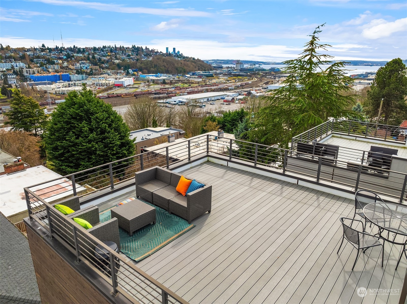 2307 West Raye Street Seattle, WA 98199 - Photo 29 of 38 an outdoor view of a patio with swimming pool and outdoor seating