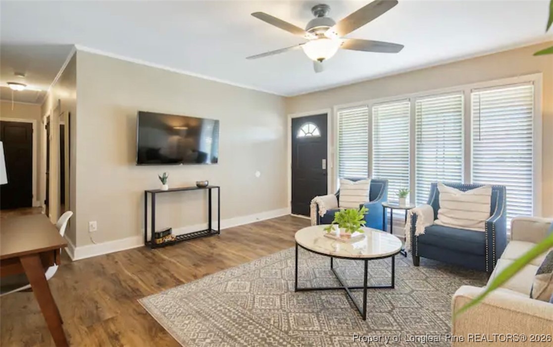 4611 Campground Road Fayetteville, NC 28314 - Photo 6 of 17 a living room with furniture and a flat screen tv