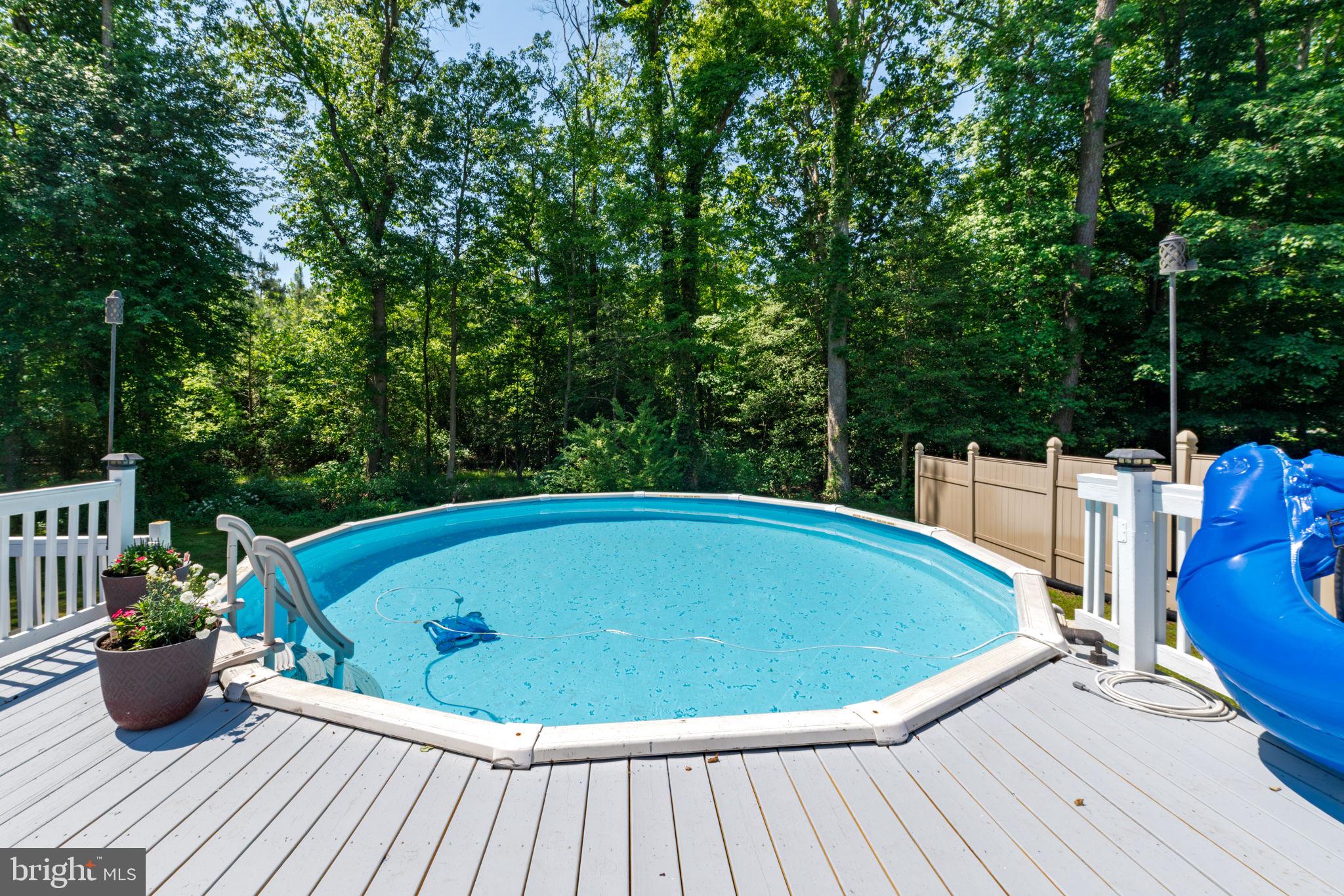 4563 Nutters Cross Road Salisbury, MD 21804 - Photo 13 of 52 a view of a swimming pool with a patio