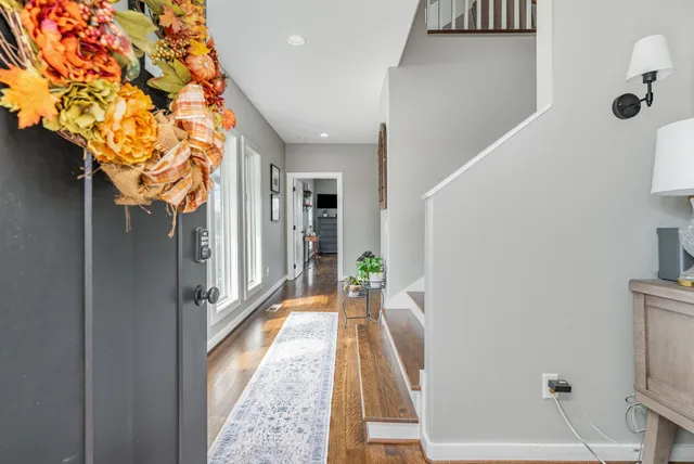 a view of a hallway view with staircase