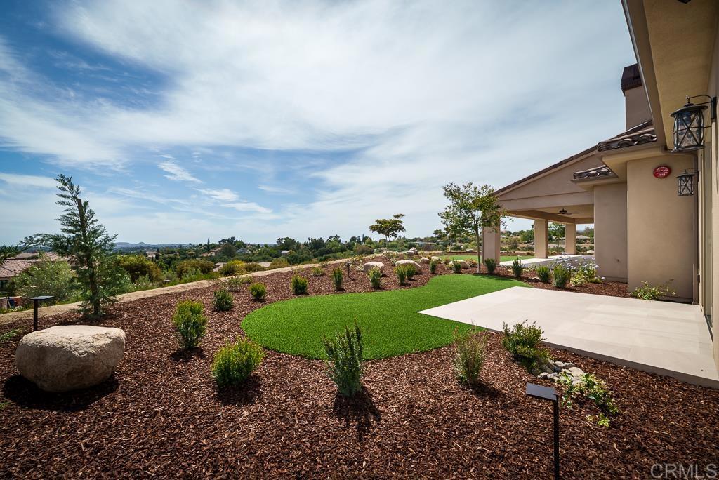 3066 Via Montevina Fallbrook, CA 92028 - Photo 54 of 75 a view of a garden with lawn chairs