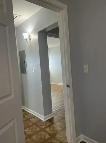 a kitchen with granite countertop cabinets stainless steel appliances and a sink