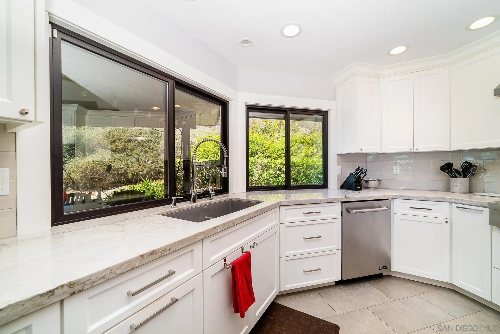 14574 Millards Road Poway, CA 92064 - Photo 17 of 75 a kitchen with granite countertop white cabinets and white stainless steel appliances