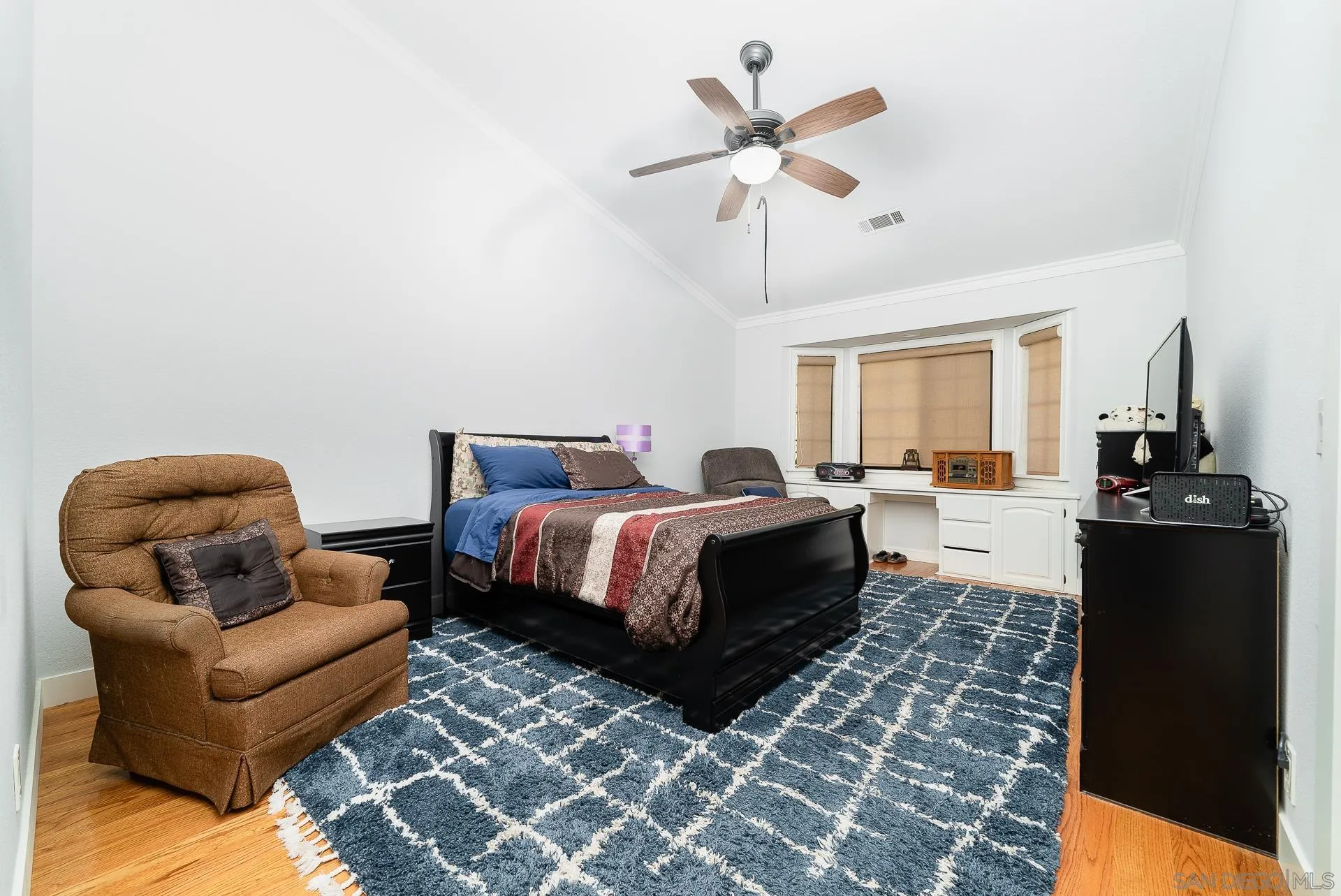 14574 Millards Road Poway, CA 92064 - Photo 34 of 75 a bedroom with a bed and wooden floor