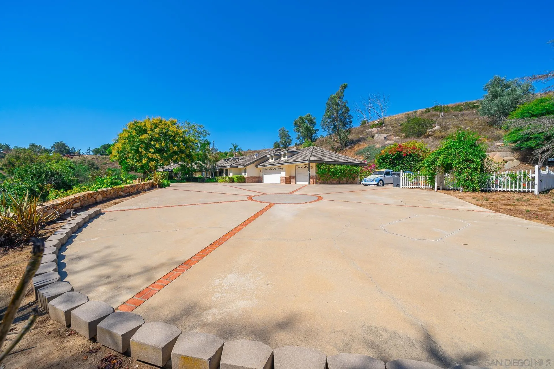 14574 Millards Road Poway, CA 92064 - Photo 45 of 75 a view of a road with a building in the background