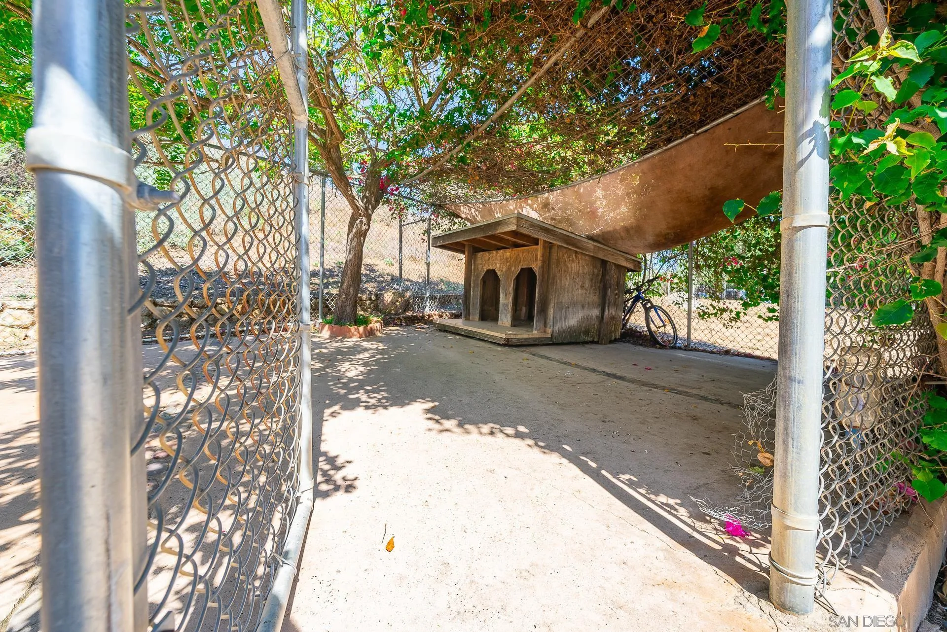 14574 Millards Road Poway, CA 92064 - Photo 49 of 75 a view of a street with a tree