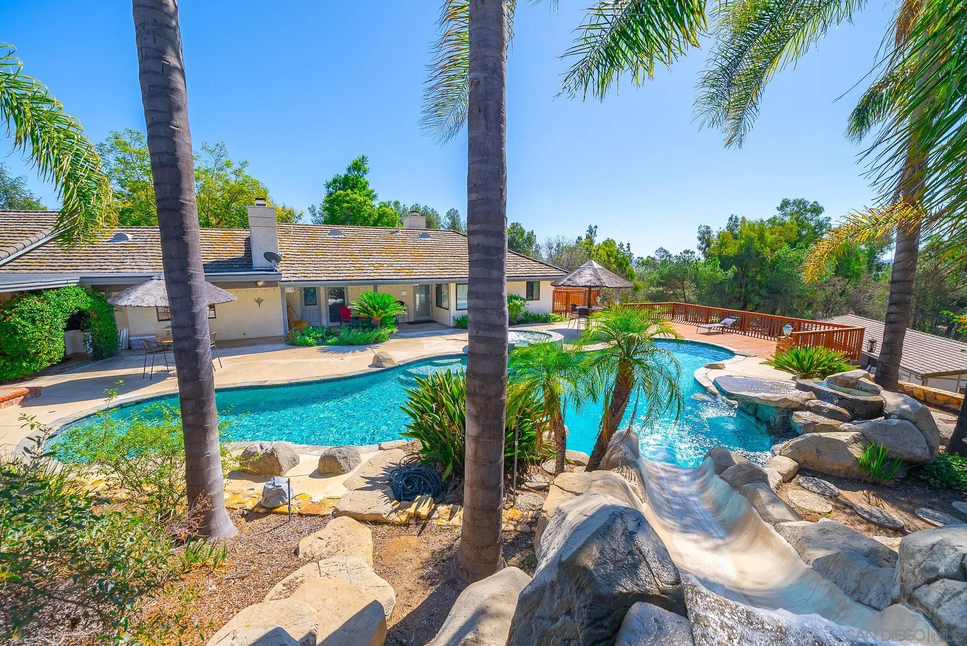 14574 Millards Road Poway, CA 92064 - Photo 69 of 75 a view of a yard and front view of a house