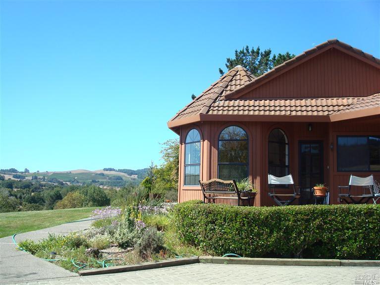 6363 Jamison Road Santa Rosa, CA 95404 - Photo 1 of 1 a front view of a house with garden