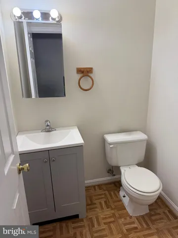 a kitchen with a sink stove and refrigerator