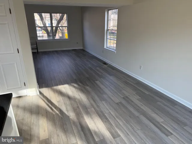 an empty room with windows