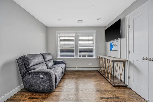 a bedroom with a bed and a cabinets