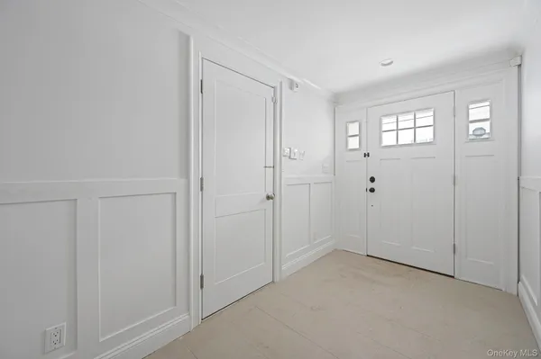 a view of an empty room with window