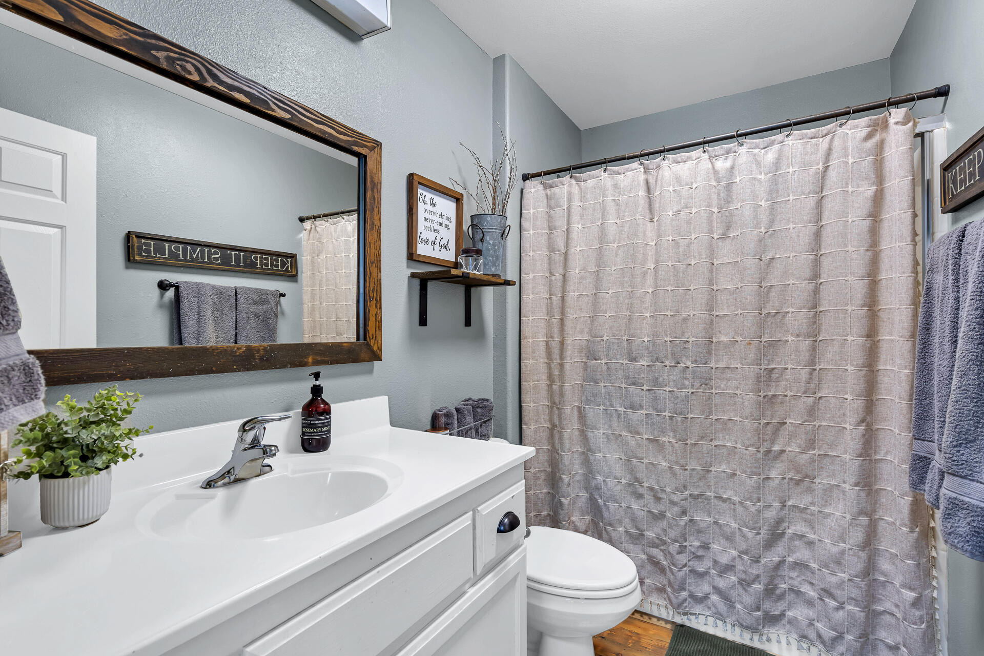 42048 Wilcox Road Hat Creek, CA 96040 - Photo 110 of 134 a bathroom with a sink and a mirror