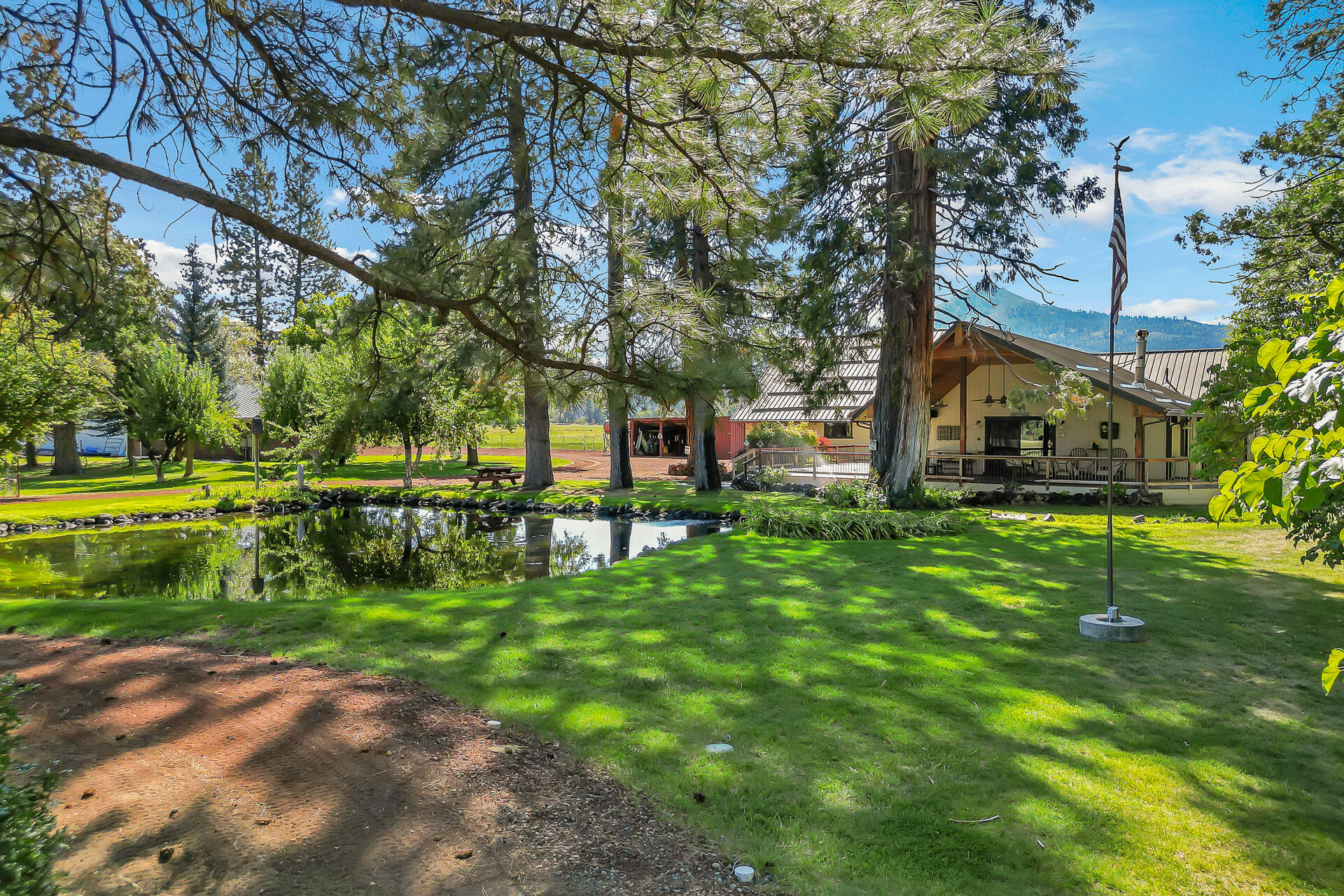 42048 Wilcox Road Hat Creek, CA 96040 - Photo 2 of 134 a view of a park with large trees