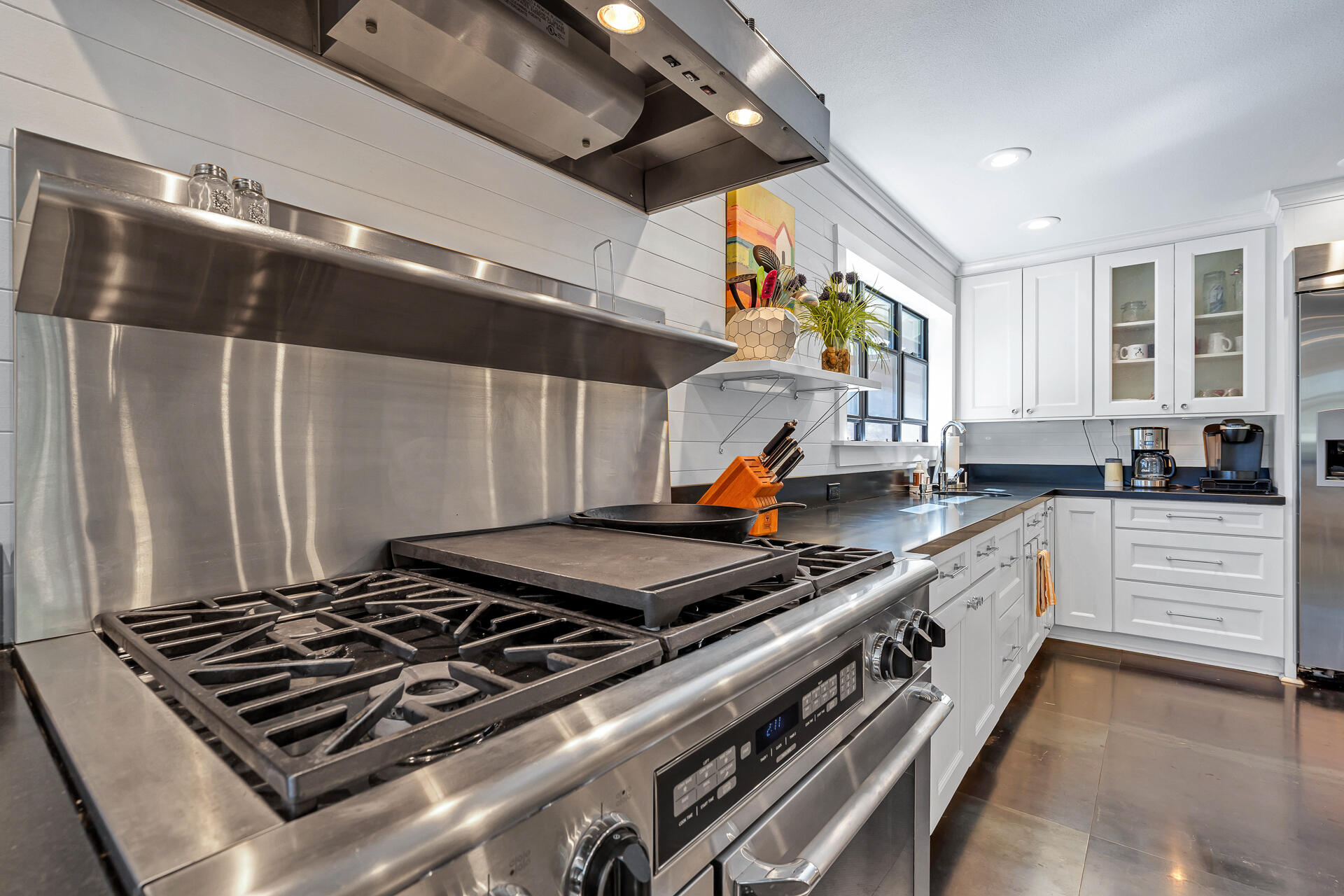42048 Wilcox Road Hat Creek, CA 96040 - Photo 29 of 134 a kitchen with stainless steel appliances granite countertop a stove and a sink