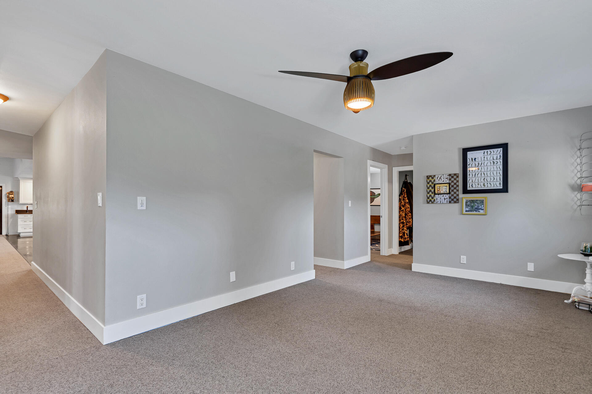 42048 Wilcox Road Hat Creek, CA 96040 - Photo 46 of 134 a view of an empty room with stairs and a ceiling fan