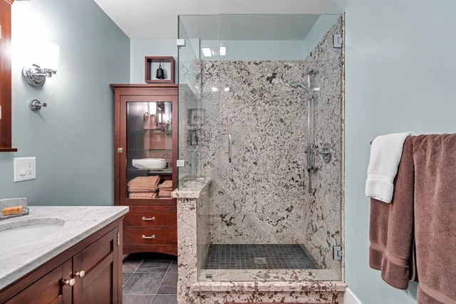 a view of swimming pool from a lake view