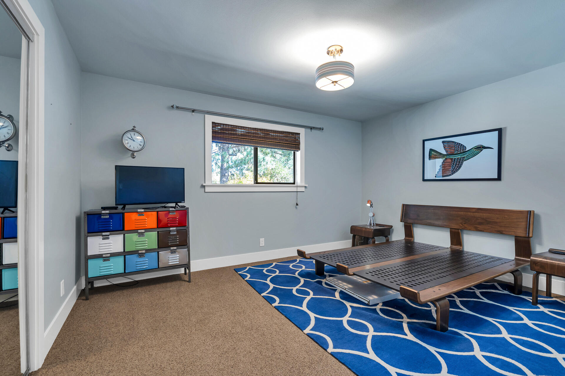 42048 Wilcox Road Hat Creek, CA 96040 - Photo 51 of 134 a living room with furniture a rug and a flat screen tv