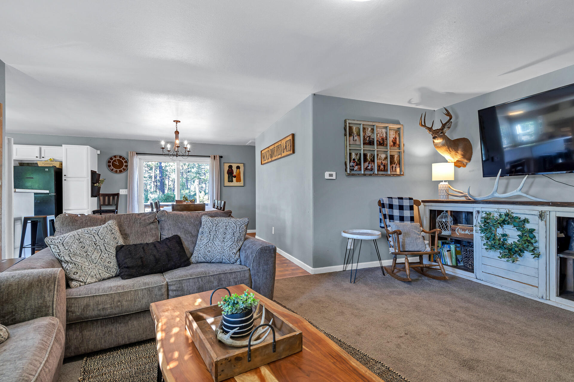 42048 Wilcox Road Hat Creek, CA 96040 - Photo 92 of 134 a living room with furniture and a flat screen tv