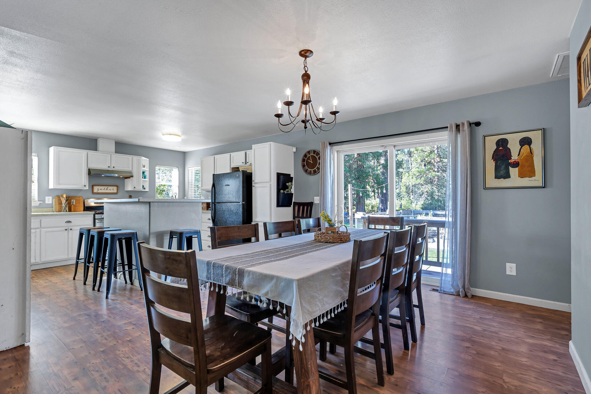 42048 Wilcox Road Hat Creek, CA 96040 - Photo 93 of 134 a view of a dining room with furniture window and wooden floor
