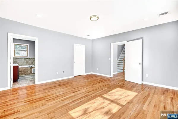 a view of a room with a window