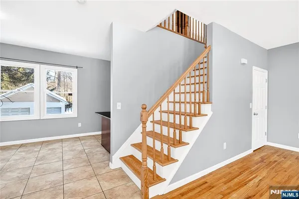 a view of a hallway with windows