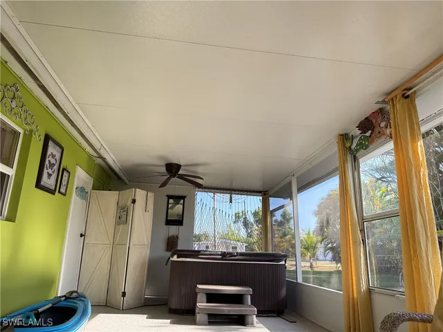 a view of a living room with a large window
