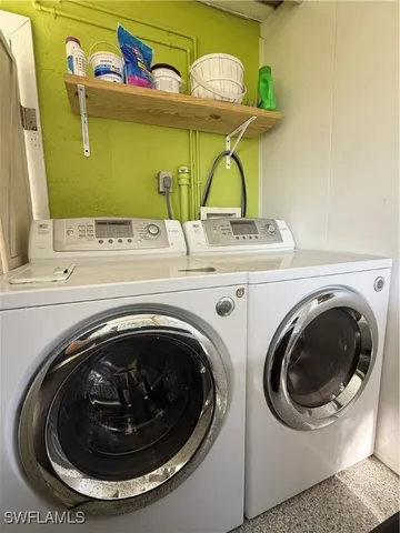 a utility room with dryer and washer
