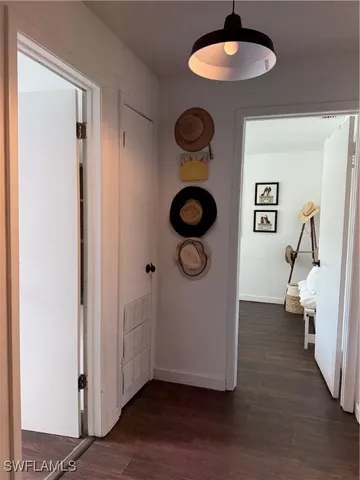 a view of a livingroom with furniture and wooden floor