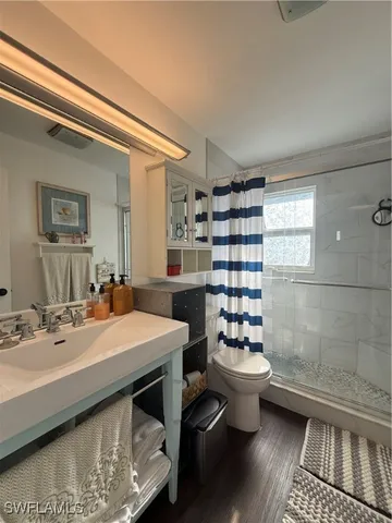 a kitchen with a sink and a stove