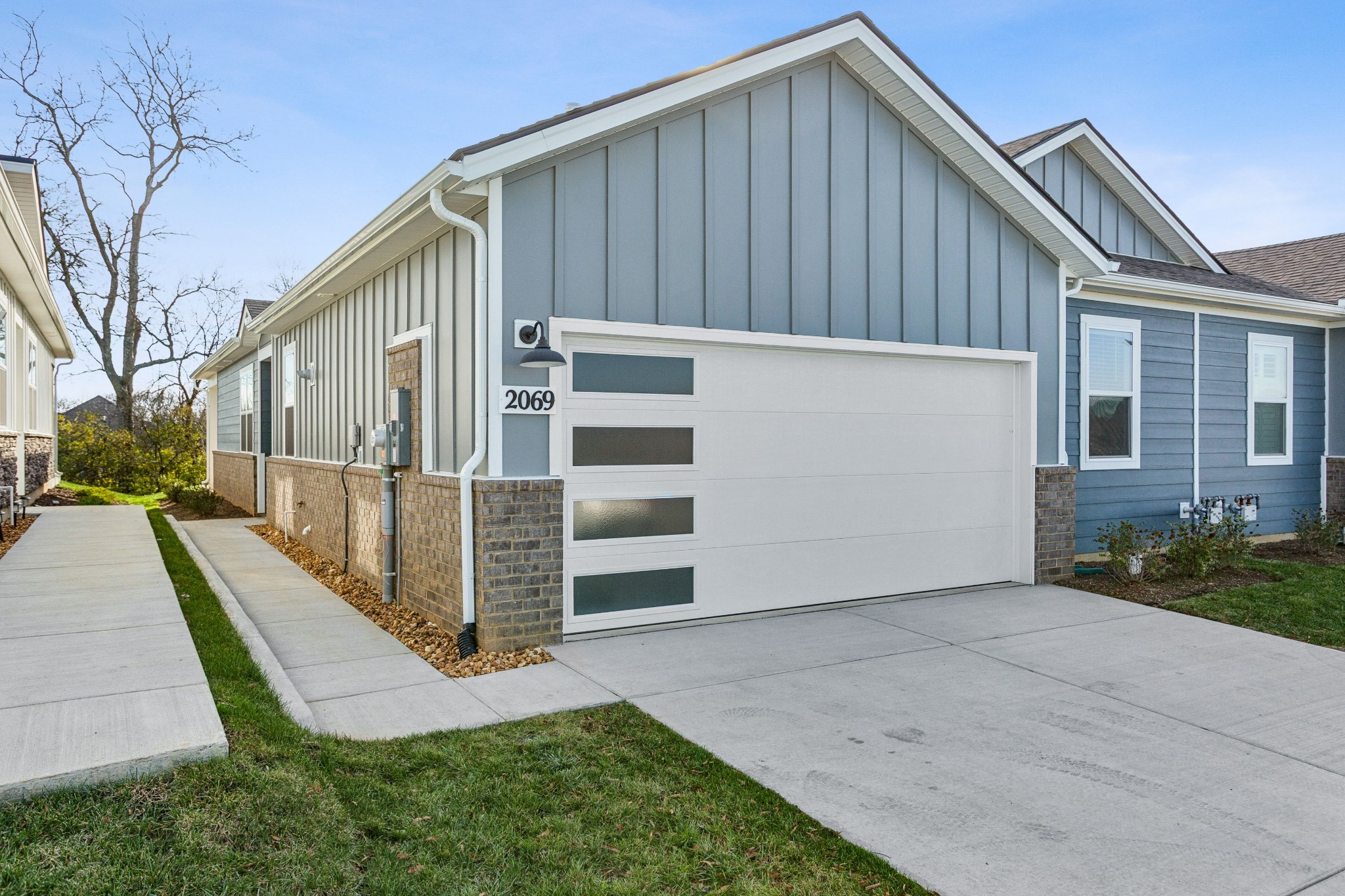 2069 Holmesburg Private Circle Gallatin, TN 37066 - Photo 1 of 16 a view of a house with a yard