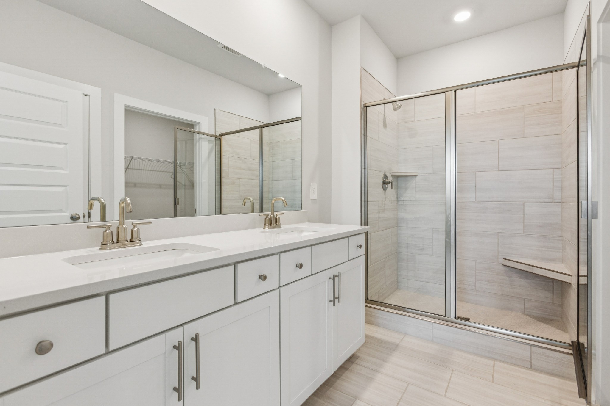 2069 Holmesburg Private Circle Gallatin, TN 37066 - Photo 10 of 16 a bathroom with a shower sink and mirror